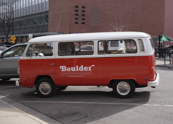 Vintage red and white Boulder van parked