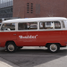 Vintage red and white Boulder van parked
