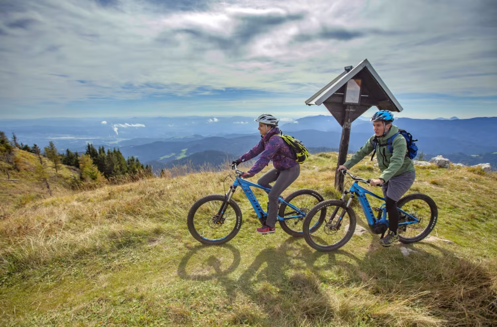 Two people mountain biking, one of many free things to do in Boulder