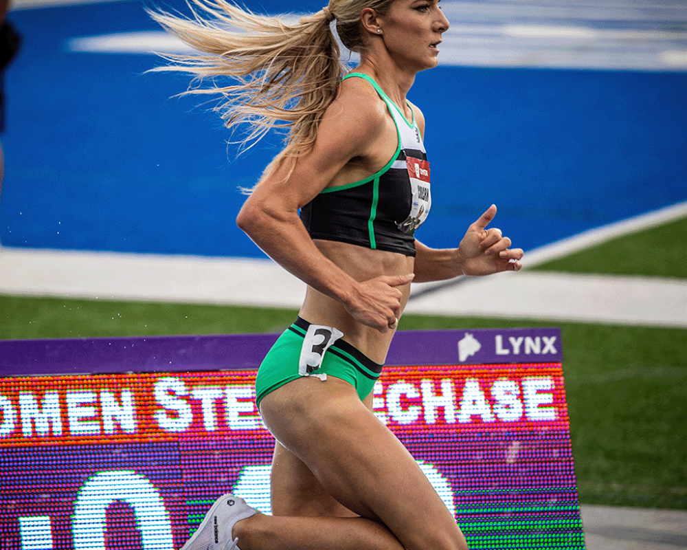 Emma Coburn running in a track race