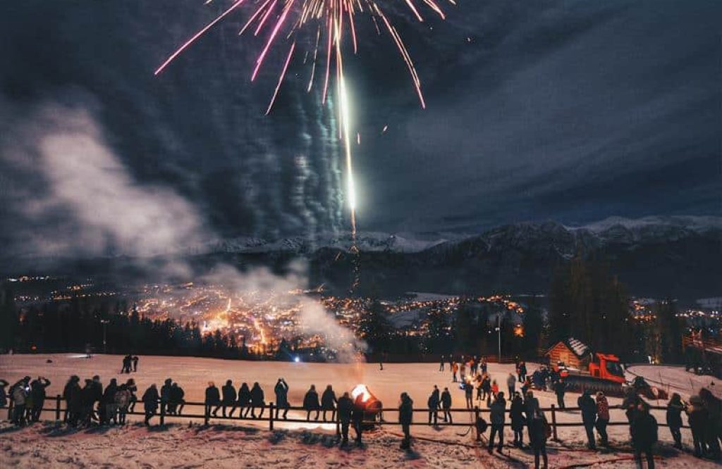 people-watching-firework-display-night